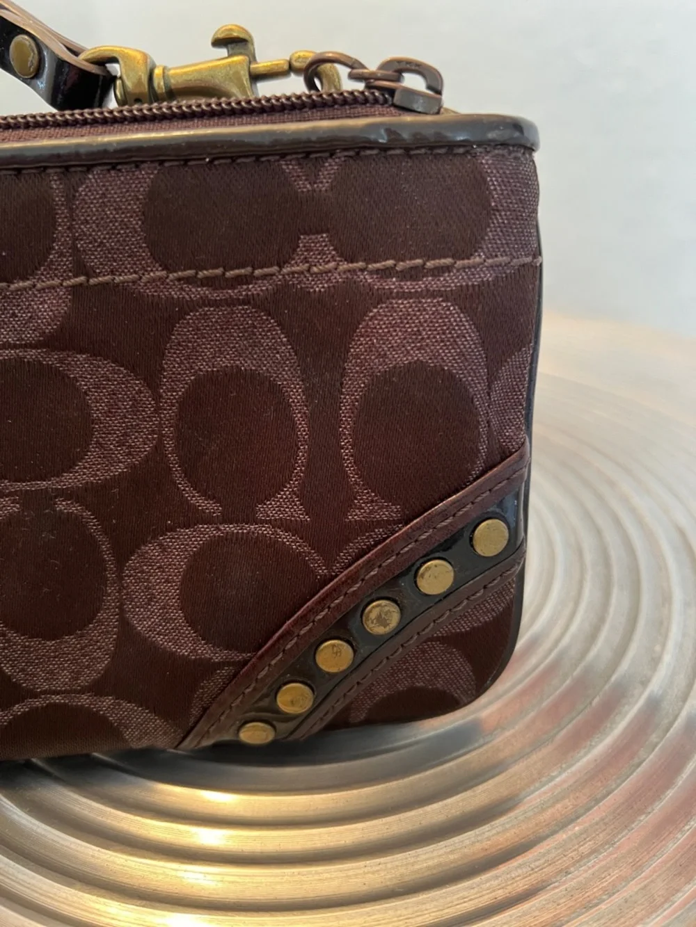 COACH EUC BROWN with BLACK PATENT WRISTLET